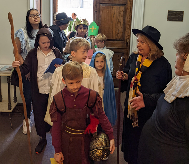 Children lined up in the church for a religious education performance